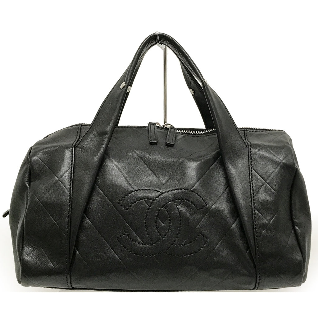 Used Chanel Mini Boston Handbag with Chevron and Coco Mark in Black Leather